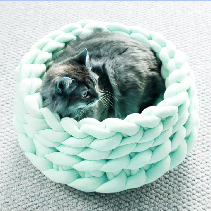 Cozy hand-woven cat bed, perfect pet furniture accessory for cats.