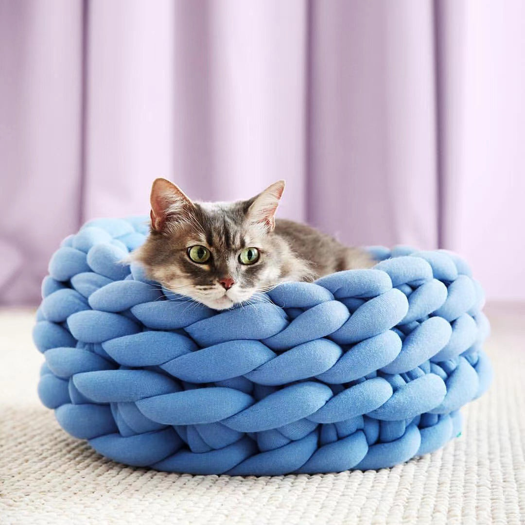 Soft hand-woven pet bed, ideal for cats & kittens, luxury comfort.