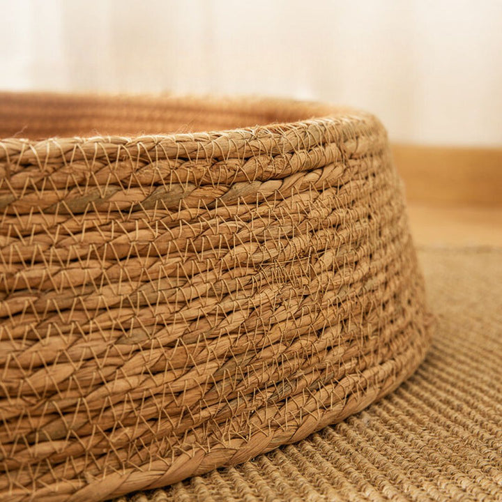 Stylish, eco-friendly hand-woven rattan cat bed. A natural pet furniture piece, perfect for rest & play.