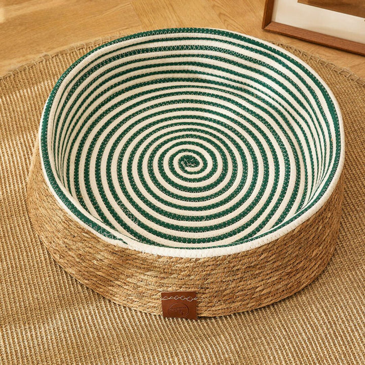 Durable natural rattan cat bed, handwoven for superior pet comfort & scratching. A sustainable pet furniture choice.