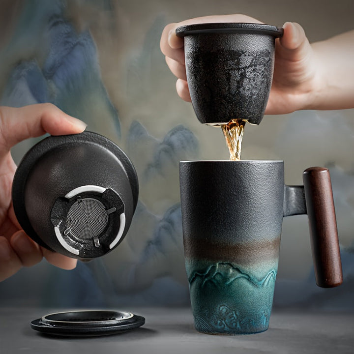Handcrafted ceramic tea mug with infuser, ideal for loose leaf tea. Unique artisan design & comfort handle.