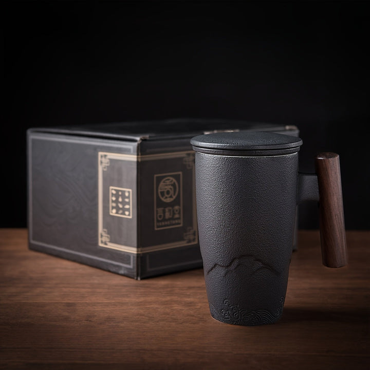 Authentic handmade tea mug with a practical infuser for enjoyable loose leaf tea brewing.