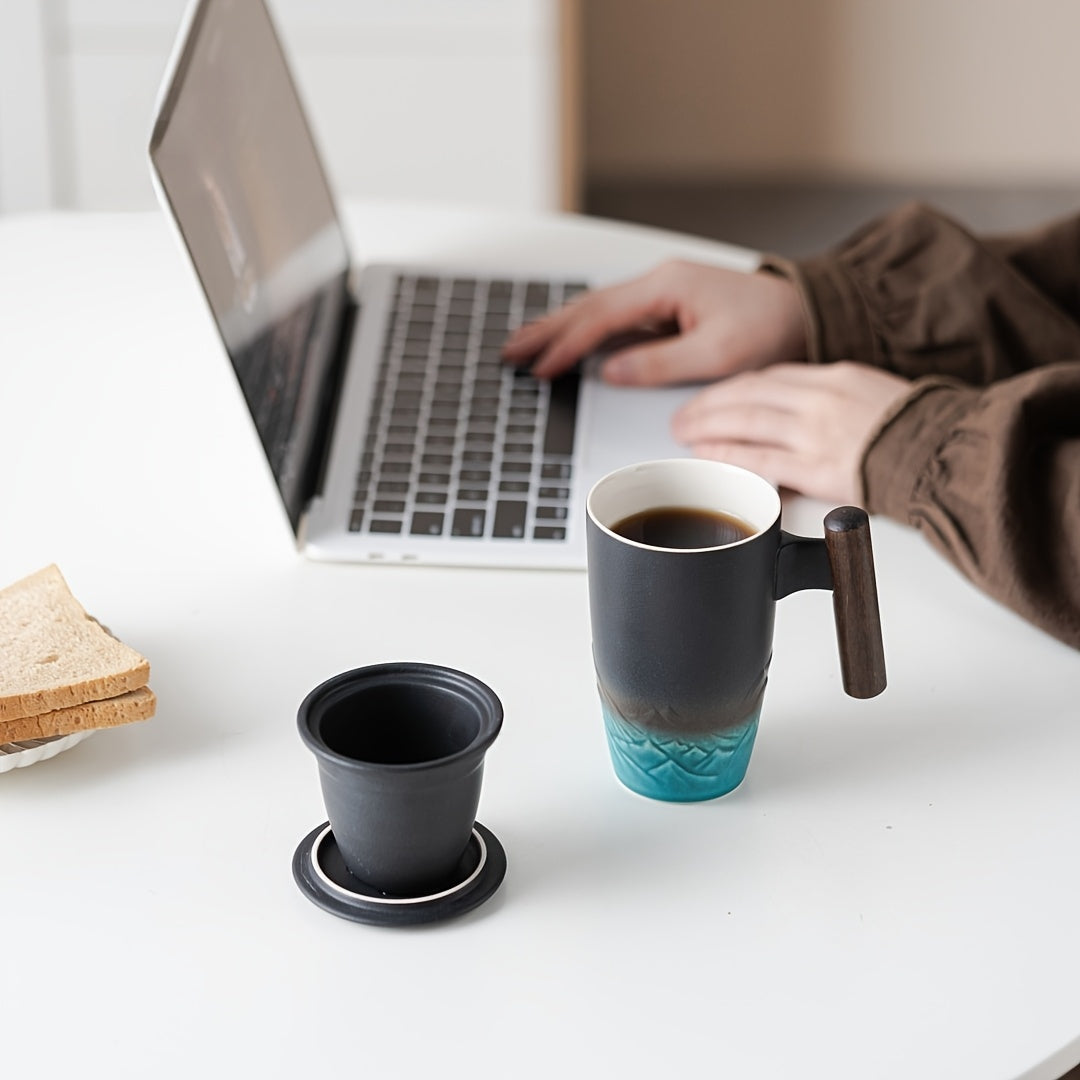 Distinctive handcrafted tea mug featuring a unique design, comfortable handle, and functional infuser.