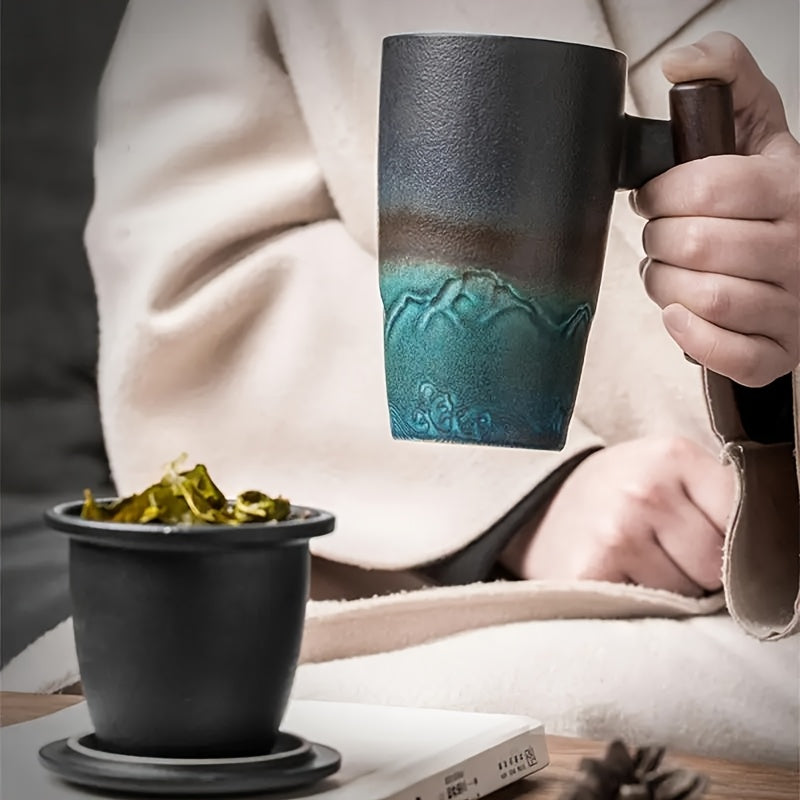 Artisan-crafted ceramic tea mug with infuser, a unique home decor piece & ideal for tea brewing.