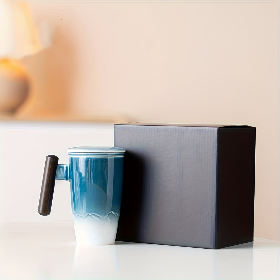 Unique ceramic tea mug, handcrafted with a comfortable handle and integrated tea infuser.
