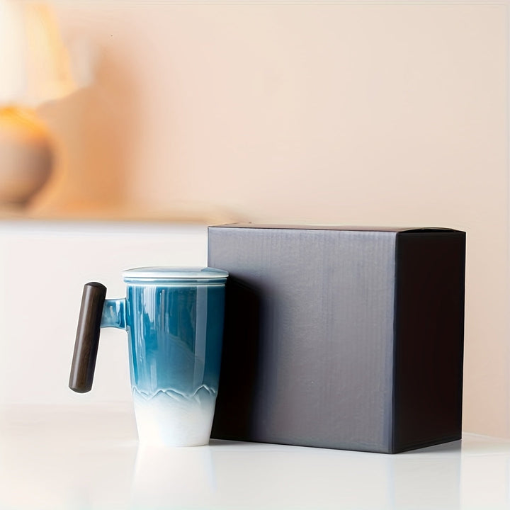 Unique ceramic tea mug, handcrafted with a comfortable handle and integrated tea infuser.