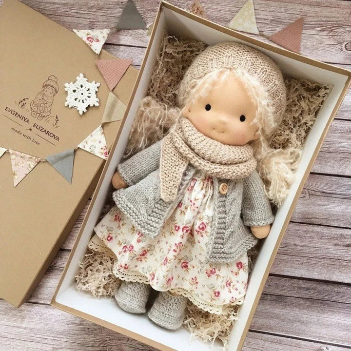 Cozy handmade cotton plush doll, a Waldorf soft toy for bedtime stories.