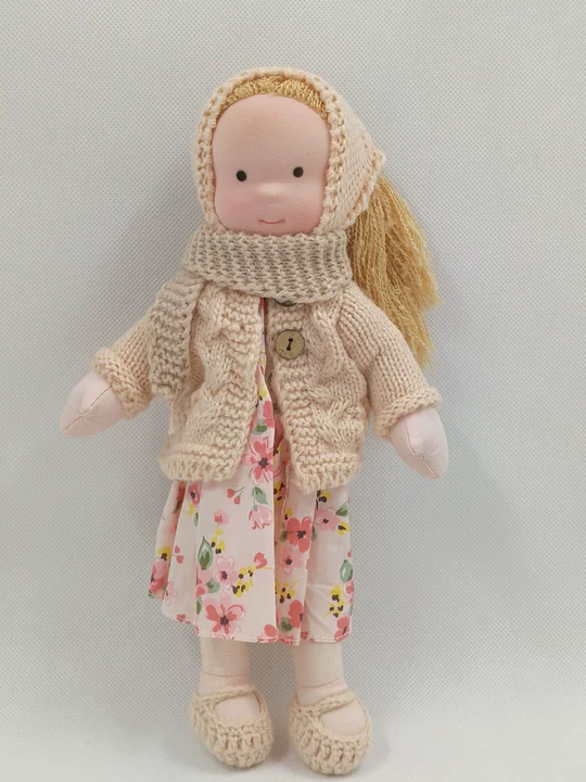 Handmade Waldorf doll by Dear Lana, soft and durable, a natural toy perfect for children's imaginative play.