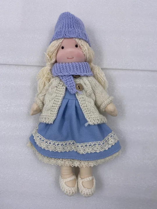 Eco-friendly handmade Waldorf doll, soft natural fibers, washable, ideal for gentle children's play & cuddles.
