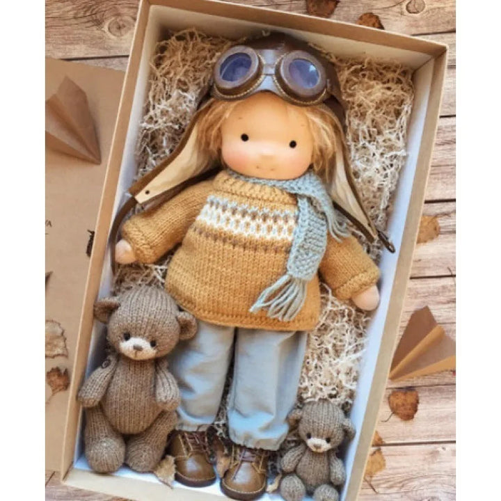 Preschooler's handmade Waldorf cotton doll, an imaginative plush toy.