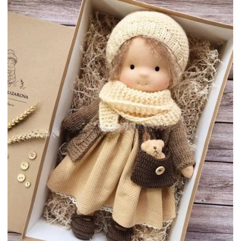 Classic handmade Waldorf cotton doll, a timeless plush toy for children.