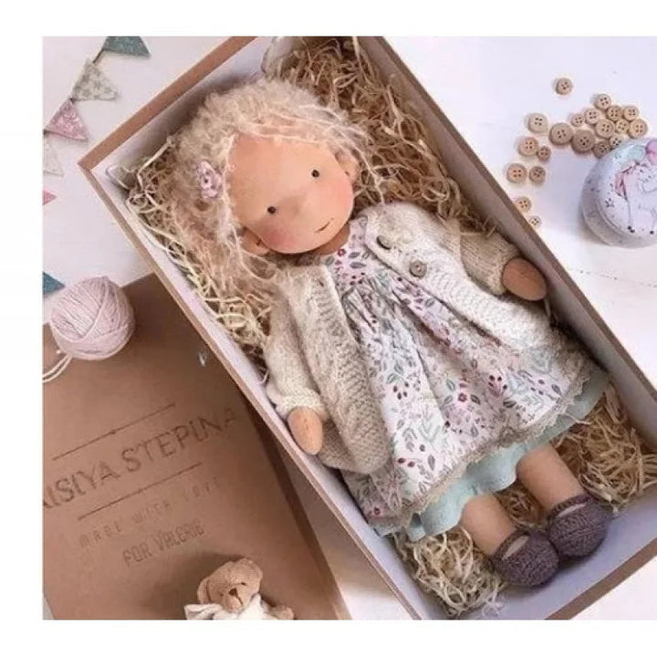 Engaging handmade Waldorf cotton doll, inspires imaginative children's play.