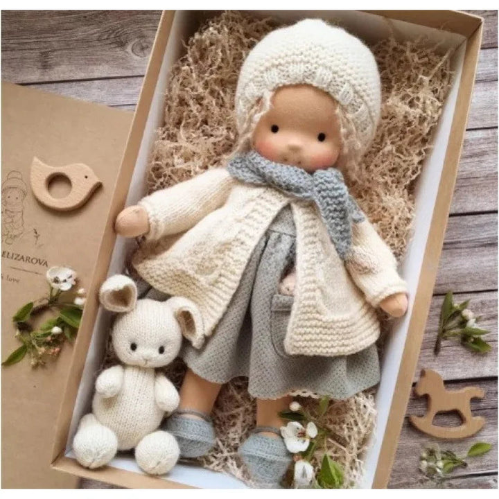 Vibrant handmade Waldorf cotton doll, a playful plush toy for imaginative minds.