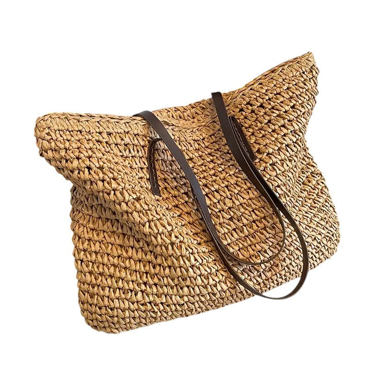 Casual handwoven tote bag with sturdy handles, a stylish accessory for summer fashion.