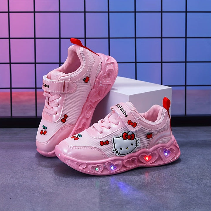 Toddler Hello Kitty light-up shoes, easy-fit design, bright LEDs & soft cushioning for little feet.