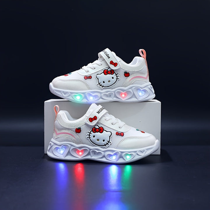 Playful pink Hello Kitty light-up sneakers for girls, comfortable active wear with cushioned sole.