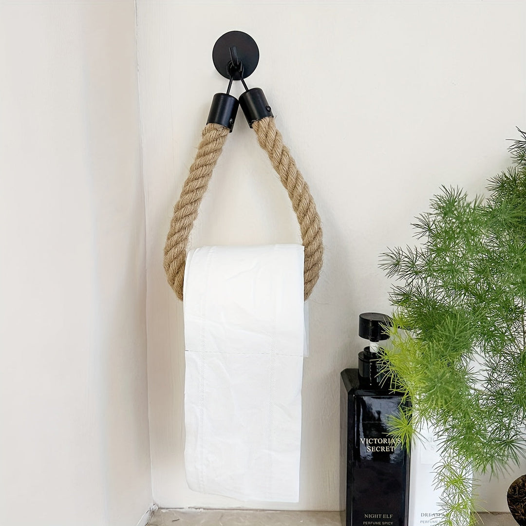 Unique rustic bathroom accessory: wall-mounted toilet paper holder with natural hemp rope detail.