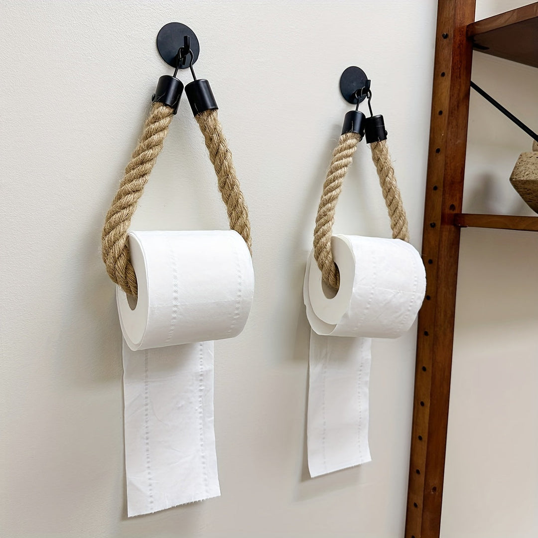 Stylish hemp rope toilet paper holder for rustic bathrooms. Wall-mounted natural fiber decor accessory.