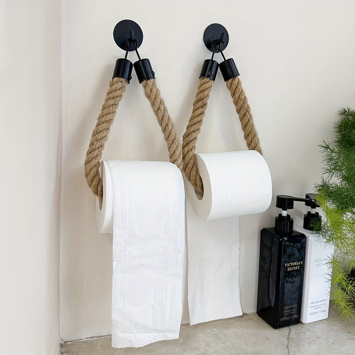 Natural hemp rope toilet paper holder, wall-mounted for rustic bathroom style. Unique decor piece.