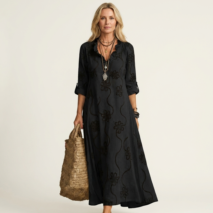Ruffled V-neck floral embroidered maxi dress for women. Chic summer casual wear.