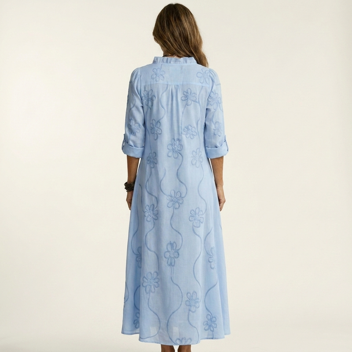 Women's V-neck ruffled floral embroidered maxi dress, a chic summer holiday option.