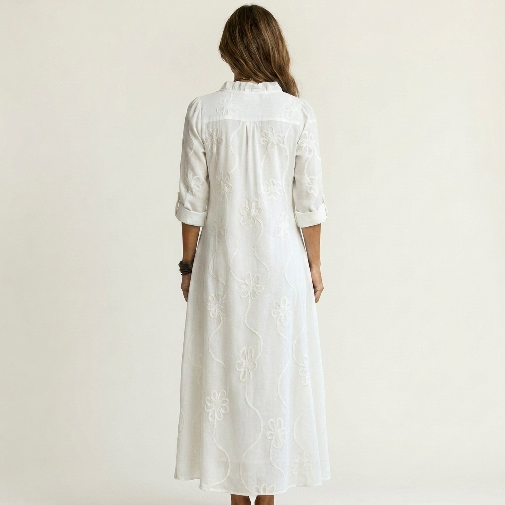 Elegant women's floral embroidered maxi dress, perfect for summer holidays and warm weather.