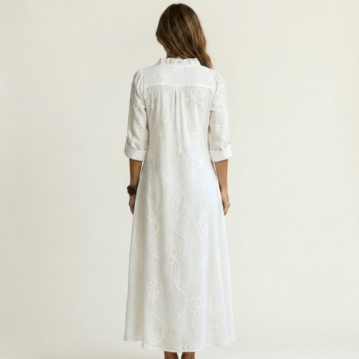Elegant women's floral embroidered maxi dress, perfect for summer holidays and warm weather.