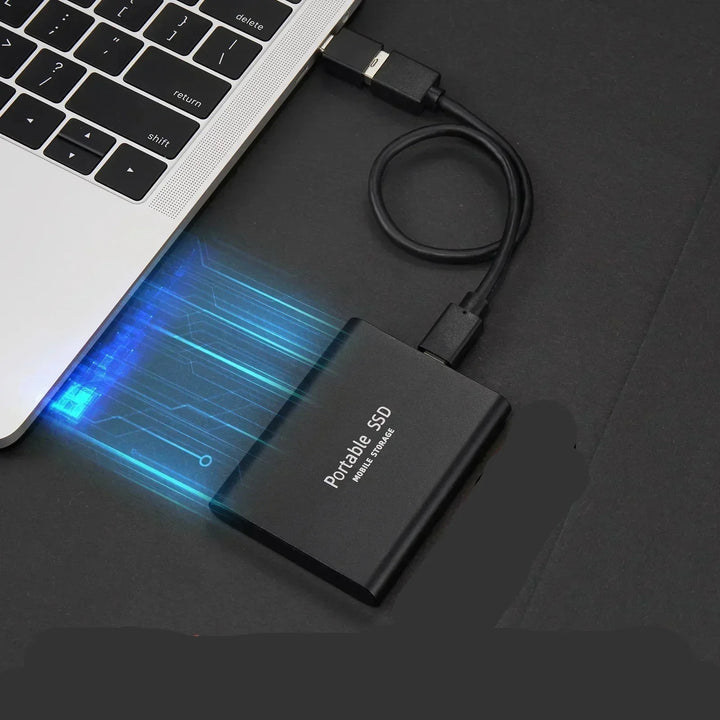 High-speed 128TB portable external SSD drive in aluminum casing, ideal for ultra-fast data backup & mobile storage.