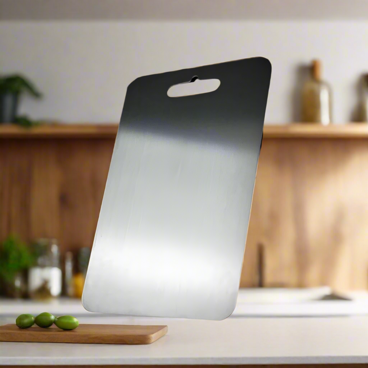 Durable titanium cutting board, dishwasher safe and odor resistant for easy kitchen cleaning.