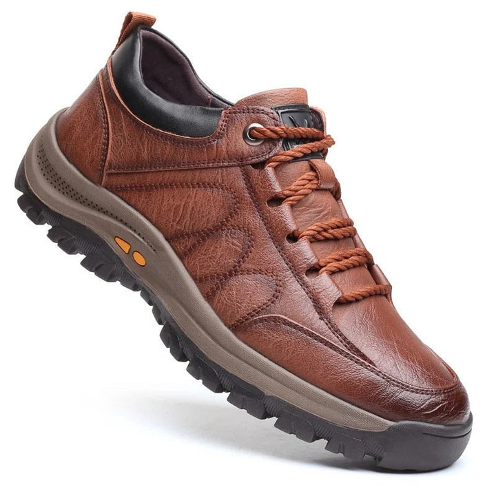 Comfortable men's casual low top shoes. Features a rugged textured finish and secure lace-up closure.