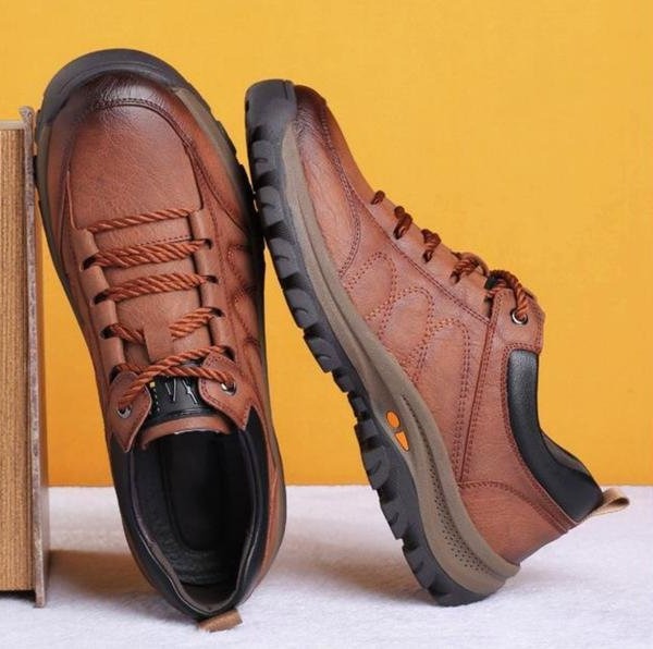 Rugged textured men's low top lace-up shoes. Comfortable, versatile footwear for modern men's casual style.