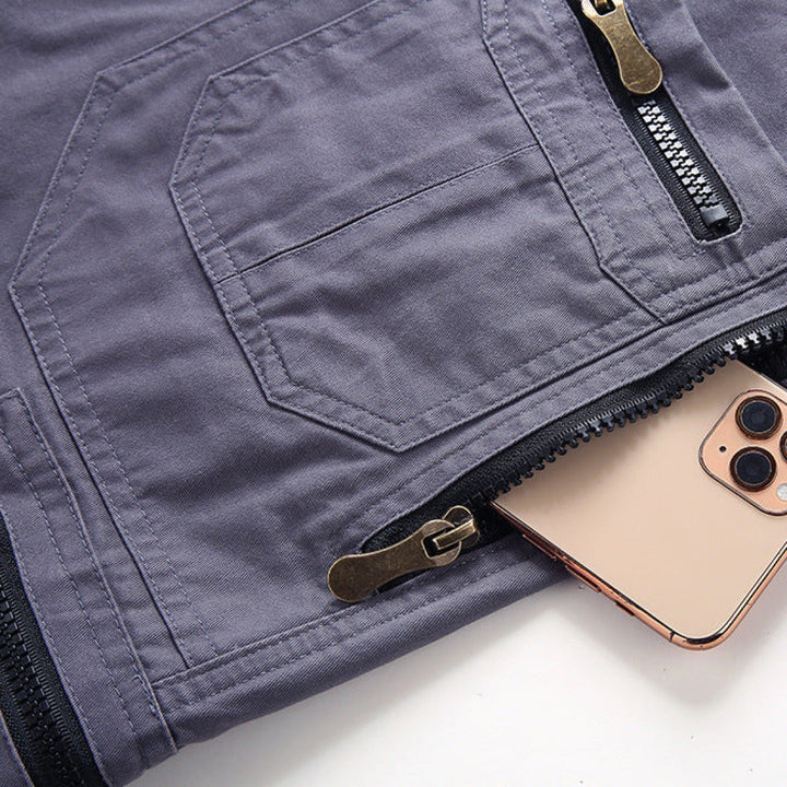 Close-up of durable men's tactical cargo shorts fabric, built for rugged outdoor adventures and long hikes.