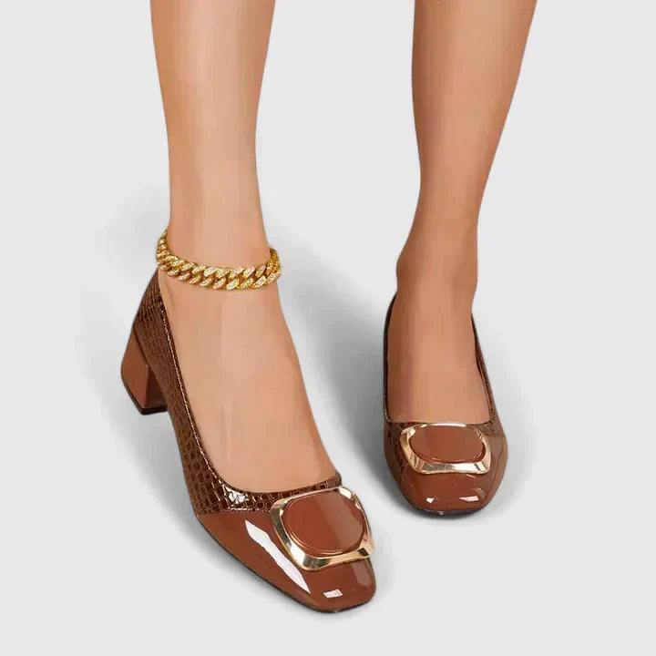 Stylish women's block heel loafers, offering comfort and support for all-day wear.