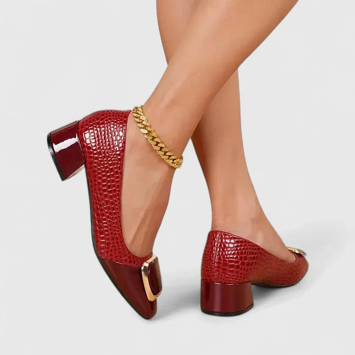Comfortable slip-on women's loafers with a stylish block heel, perfect for everyday wear.