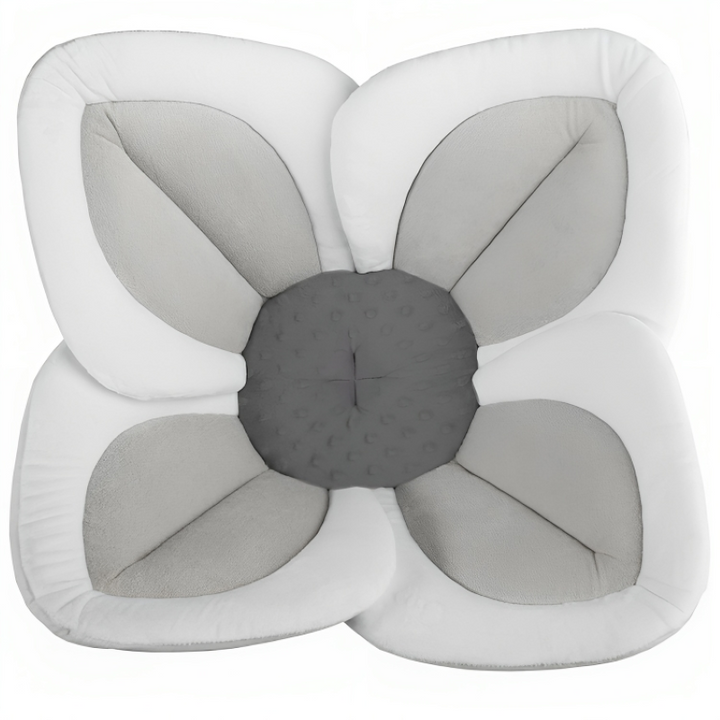 Safe infant flower bath seat. Plush, soft baby bath support for newborns, making bathing cozy & secure.