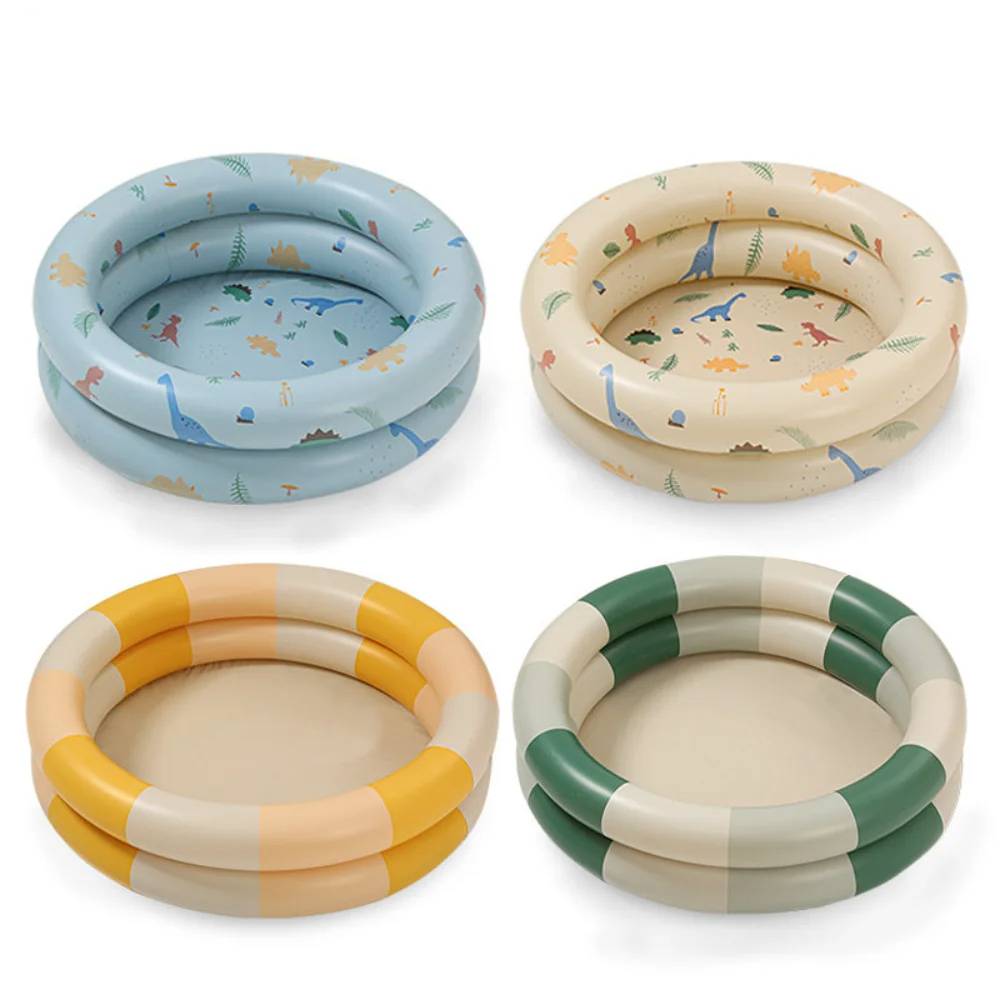Children's inflatable splash pool for backyard water play. Toddler-safe outdoor toy for summer fun. Easy to set up.