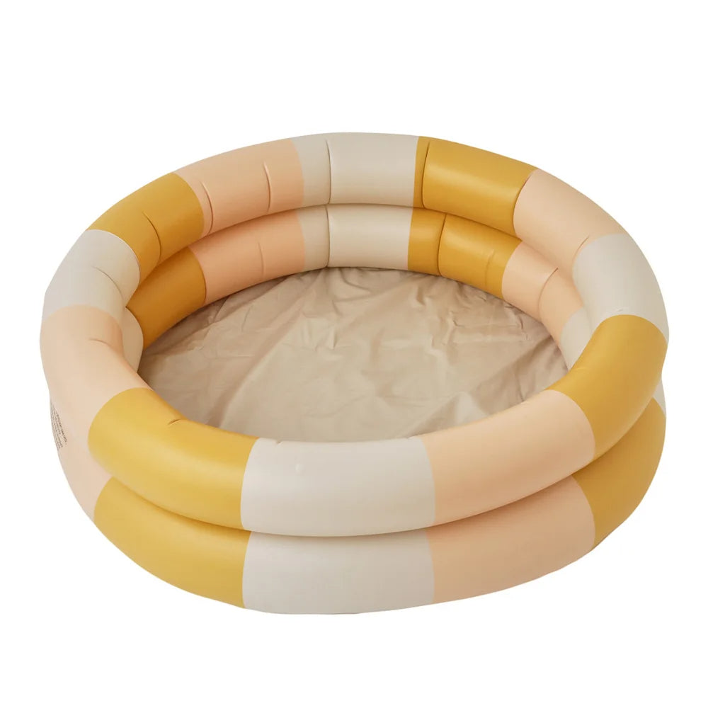 Vibrant inflatable baby pool, a fun outdoor water toy for kids. Perfect for summer backyard splash & water activities.