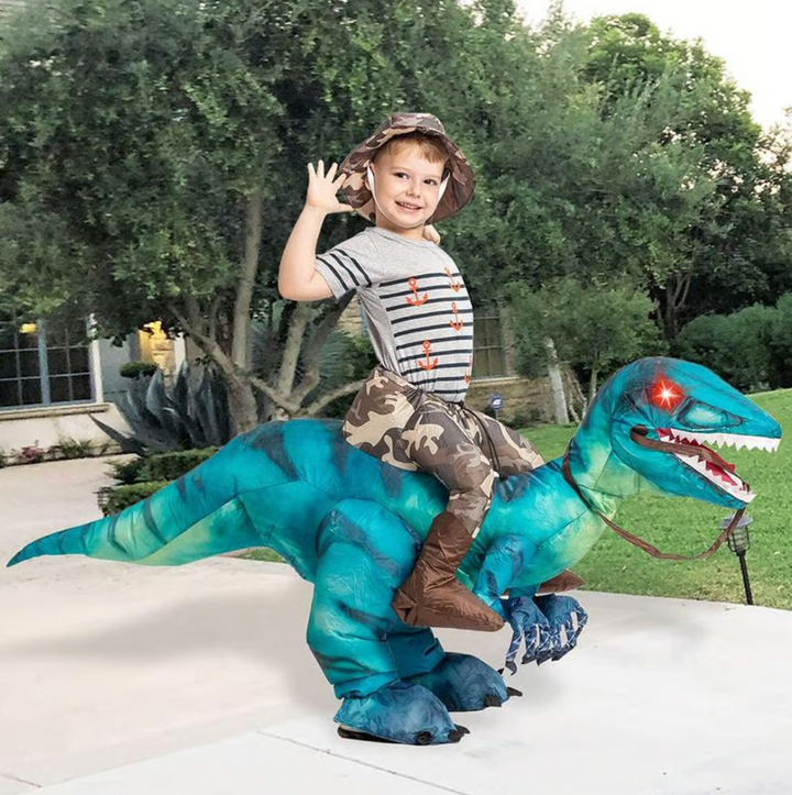 Inflatable blue & red dinosaur ride-on toy for kids & adults, perfect for active indoor/outdoor play & parties.