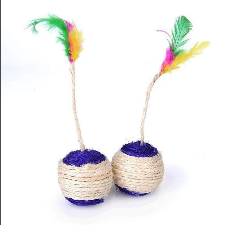 Close-up of interactive cat ball, showing sisal rope texture & soft feather detail for cats.