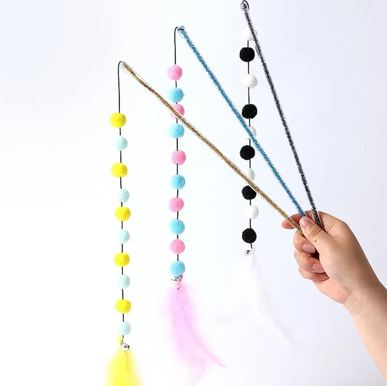 Engaging kitten toy: cat fishing rod featuring soft pom-poms & long wand for active pet playtime.