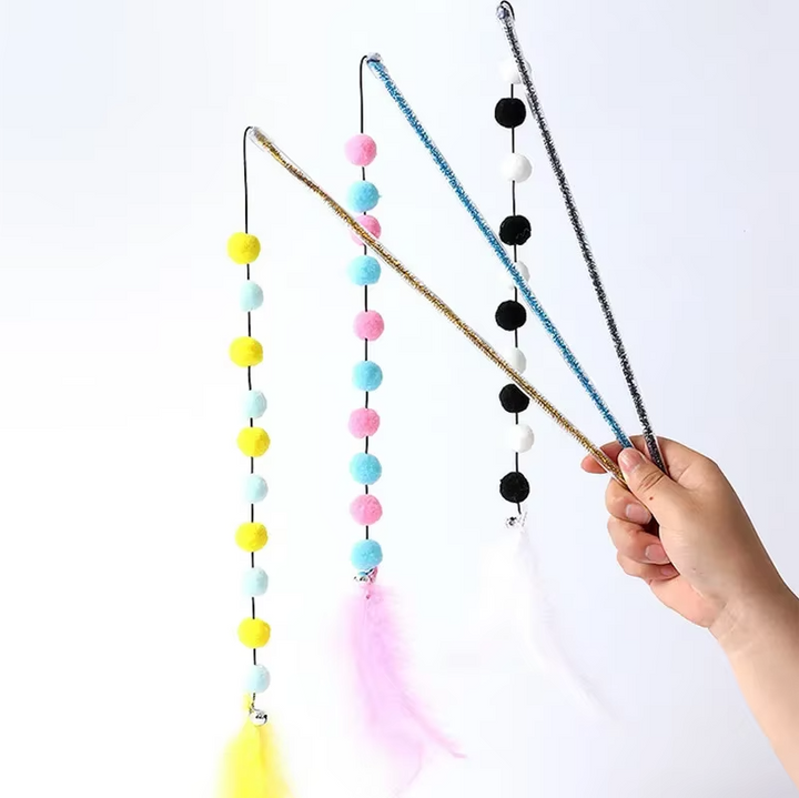 Engaging kitten toy: cat fishing rod featuring soft pom-poms & long wand for active pet playtime.