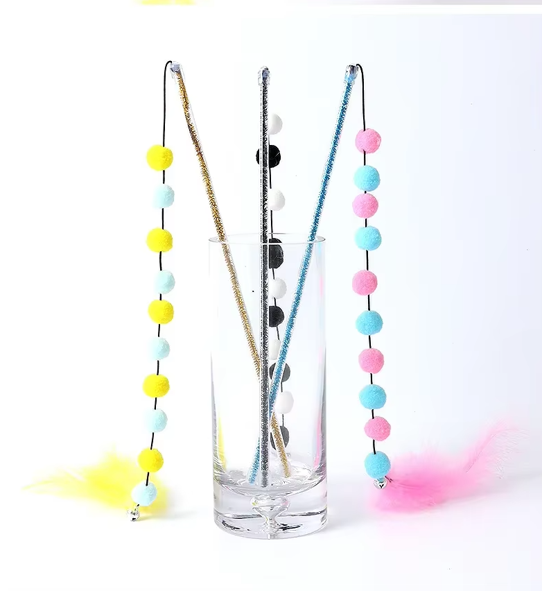 Dynamic interactive cat fishing rod toy with feathers & pom-poms, encouraging playful exercise.