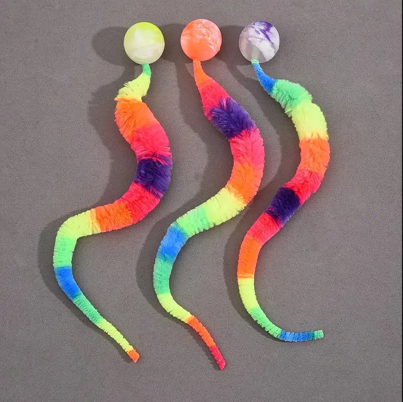 Playful interactive cat toy: soft plush with wiggly tail & attached ball for endless fun.