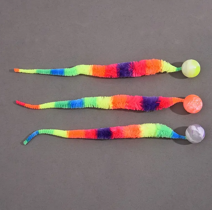 Soft plush interactive cat toy with a wiggle tail & attached ball for engaging feline play.