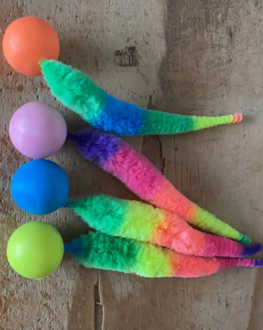 Stress-relief interactive cat toy, soft plush with a wiggle tail & ball for joyful play.
