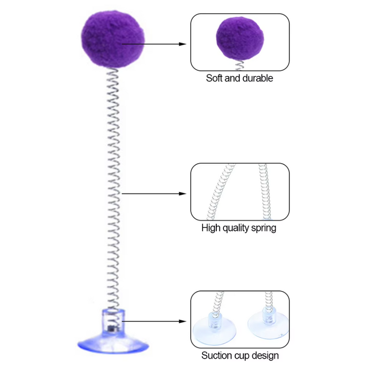 Cat batting a shuttlecock spring toy, secured by a suction cup, providing hours of interactive feline fun.