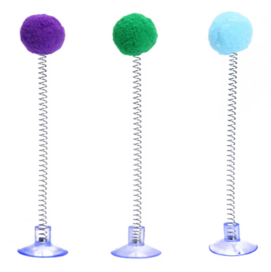 Feline enrichment shuttlecock toy with a spring & pompom, designed with a strong suction cup for play.