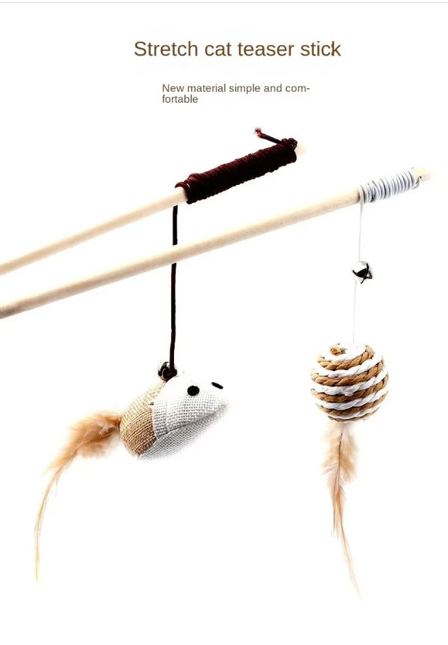 Playful cat batting a natural feather wand toy, promoting active enrichment and interactive play.