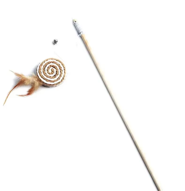 Assortment of natural cat toys: feather, bell, wood, and sisal for varied interactive enrichment.