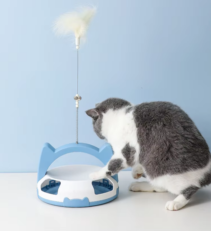 Dynamic interactive cat toy for active pets; includes feather and rolling ball for mental enrichment.